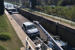 barge with car in the lock