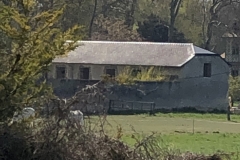 country farmhouse on one side...