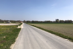 road to village with old church