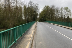 bridge leaving the river and canal